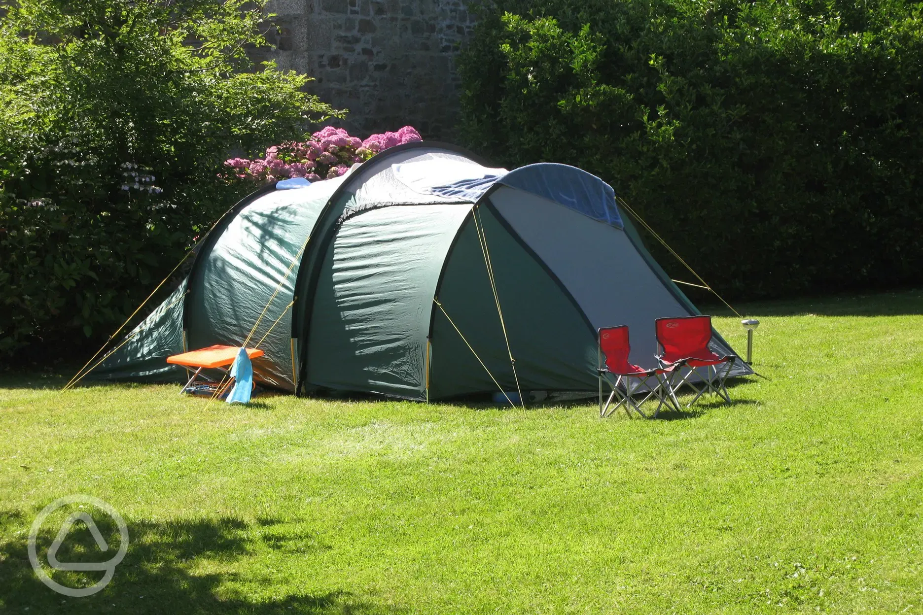 Grass pitches on The Lawn, reserved for backpackers