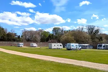 Electric grass touring pitches (8m x 10m) with 16 amp hook ups