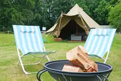 Barn Owl bell tent with outdoor seating and a fire pit Barn Owl bell tent with outdoor seating and a fire pit