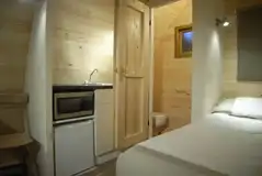 Ensuite glamping pod kitchen and ensuite loo (shared showers)