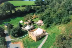 Aerial of the bell tents with a communal kitchen