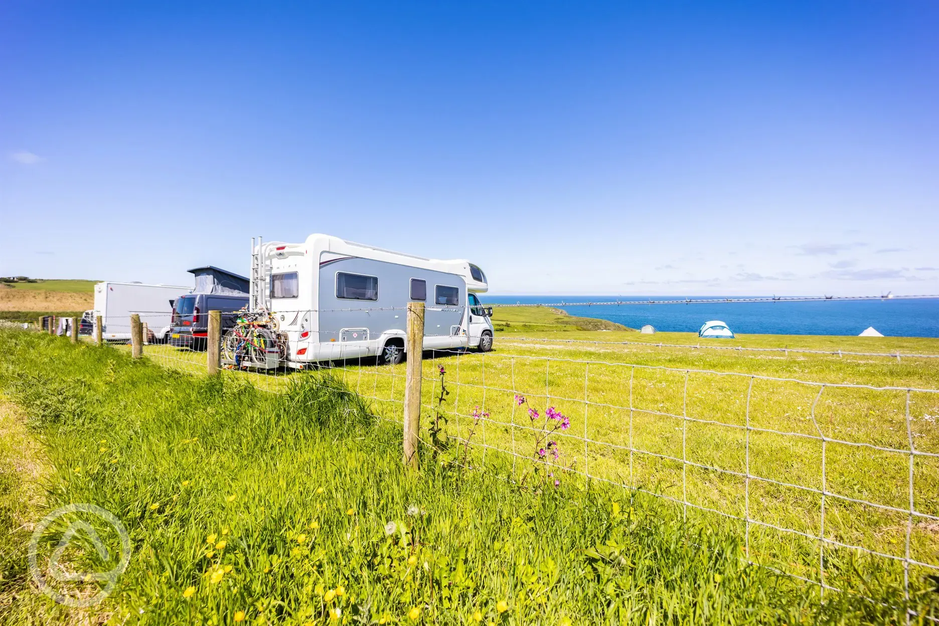 Non electric grass pitches with sea views