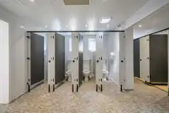 Private toilet cubicles in the facility block