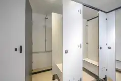 Shower cubicles with a changing bench