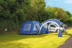 Electric grass tent pitches with a 16 amp electric hook up 