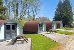 Camping pods with outdoor picnic benches Camping pods with outdoor picnic benches