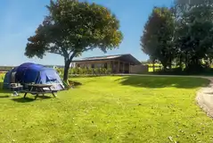 Grass pitches with 10 amp electric hook ups