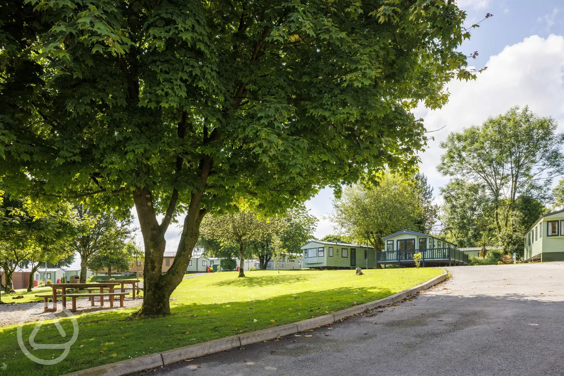 Landscaped grounds and static caravans