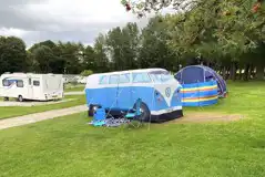 Grass 6m x 6m pitches (non electric and 10 amp electric options) Grass 6m x 6m pitches (non electric and 10 amp electric options)