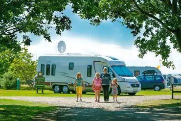 Electric hardstanding and grass touring pitches