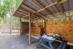 Glamping pod outdoor kitchen with a picnic bench Glamping pod outdoor kitchen with a picnic bench