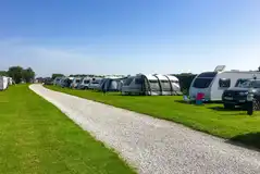 Electric grass pitches with 10 amp electric at Burton Constable Holiday Park