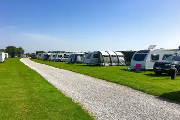 Electric grass pitches with 10 amp electric at Burton Constable Holiday Park