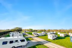 Electric hardstanding pitches for caravans, campervans and motorhomes Electric hardstanding pitches for caravans, campervans and motorhomes