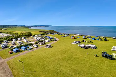 Grass pitches with sea views and all weather touring super pitches