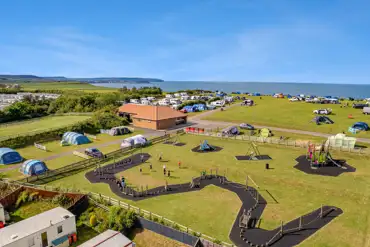 Aerial view of Crows Nest pitches and play area overlooking the Yorkshire coast