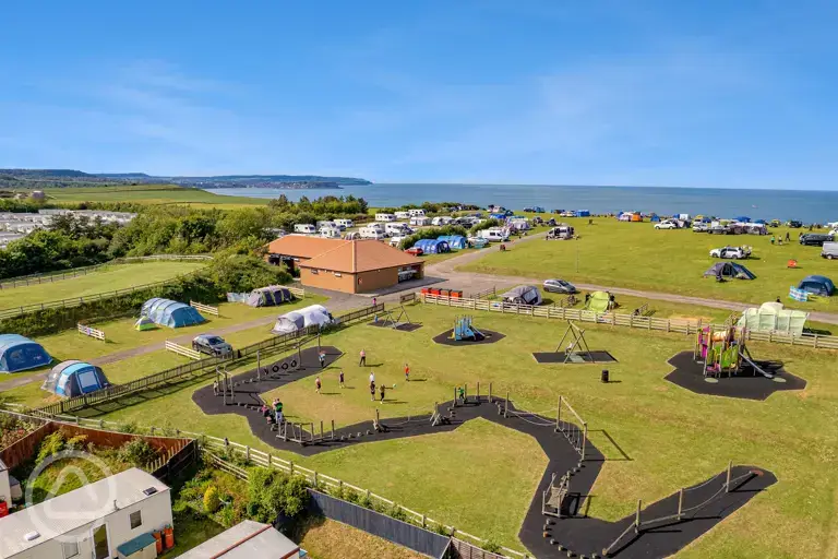 Aerial view of Crows Nest pitches and play area overlooking the Yorkshire coast