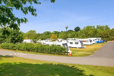 Caravans on electric grass pitches