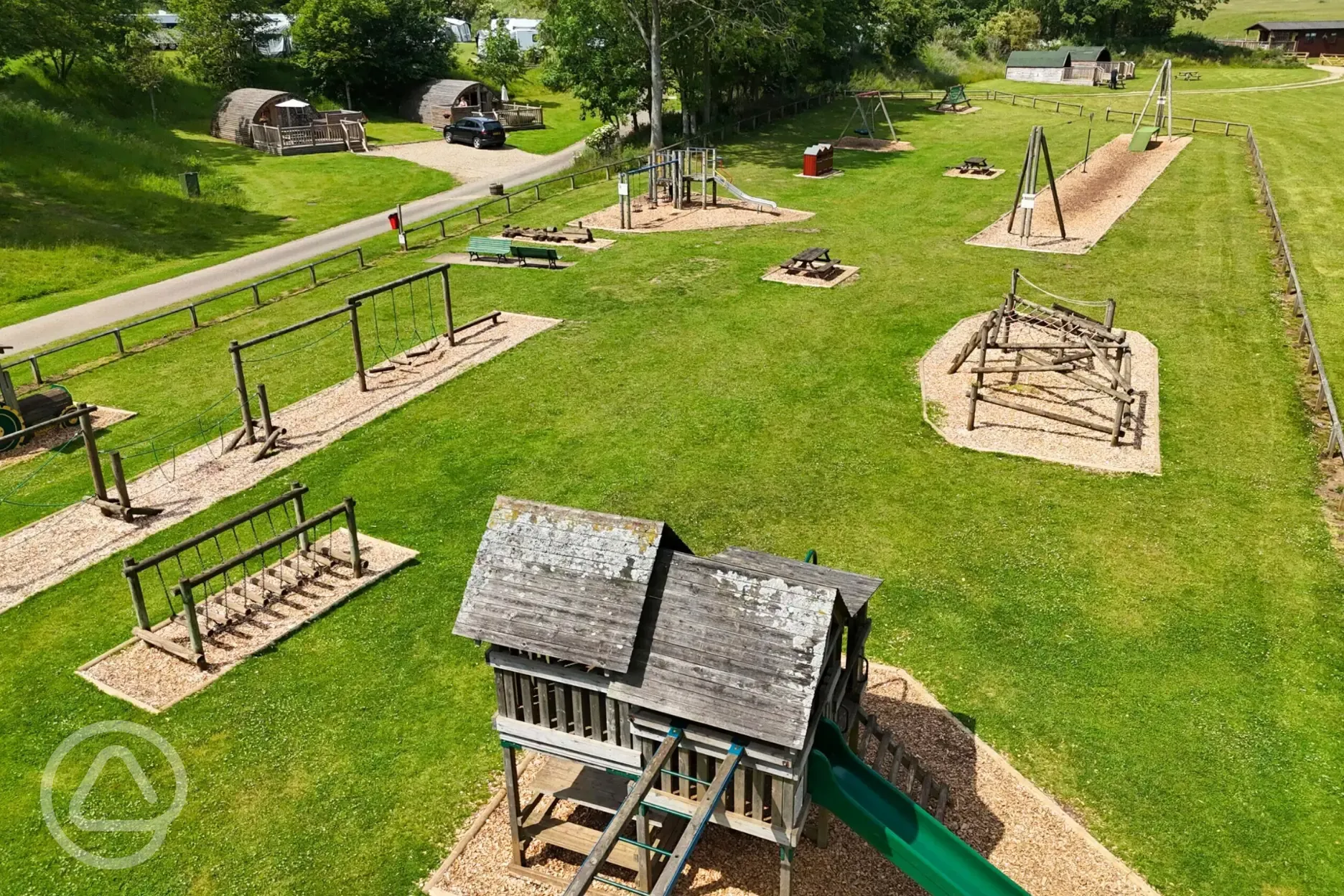 Aerial of the adventure play park with a zip wire and climbing frames
