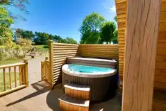 Ensuite glamping pod with hot tub and private decking area Ensuite glamping pod with hot tub and private decking area