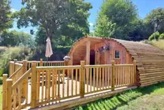 Glamping pod with hot tub exterior with private decking and hot tub Glamping pod with hot tub exterior with private decking and hot tub