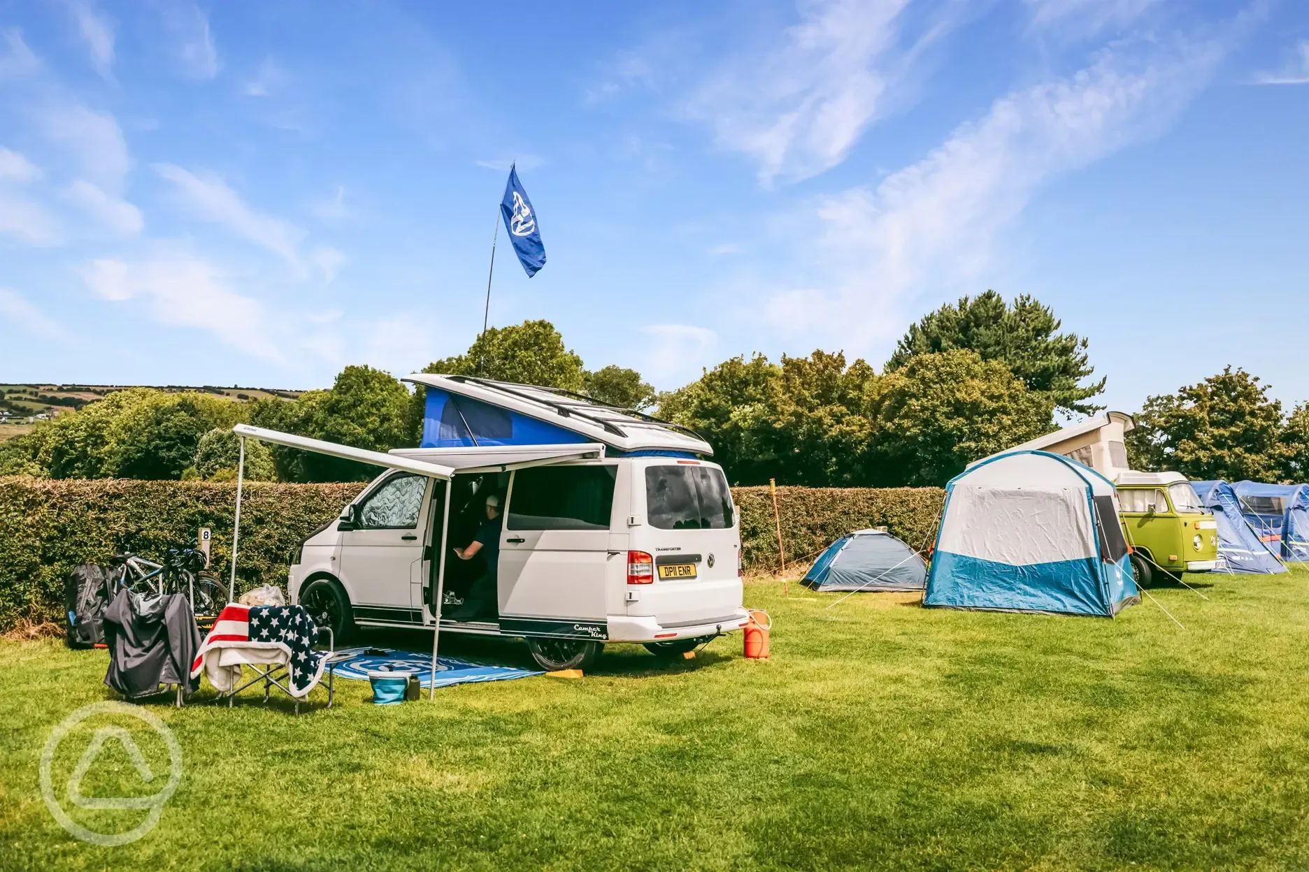 Electric grass pitches at Middlewood Farm Holiday Park with 10 amp electric