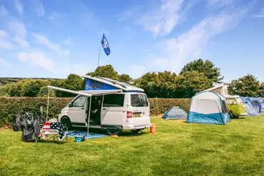 Electric grass pitches at Middlewood Farm Holiday Park with 10 amp electric