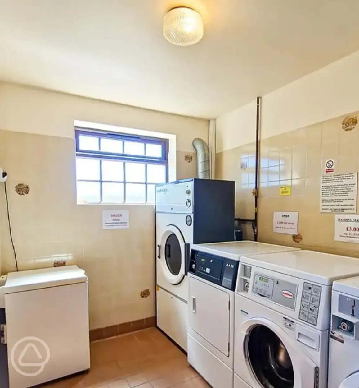 Coin operated laundry room with washers and dryers