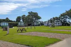 Site overview with children's playpark in the middle Site overview with children's playpark in the middle