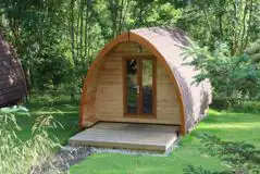 Camping pods surrounded by woodland Camping pods surrounded by woodland