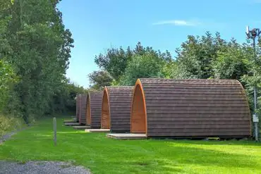 Camping pods, unfurnished with an electric heater, electricity and lighting