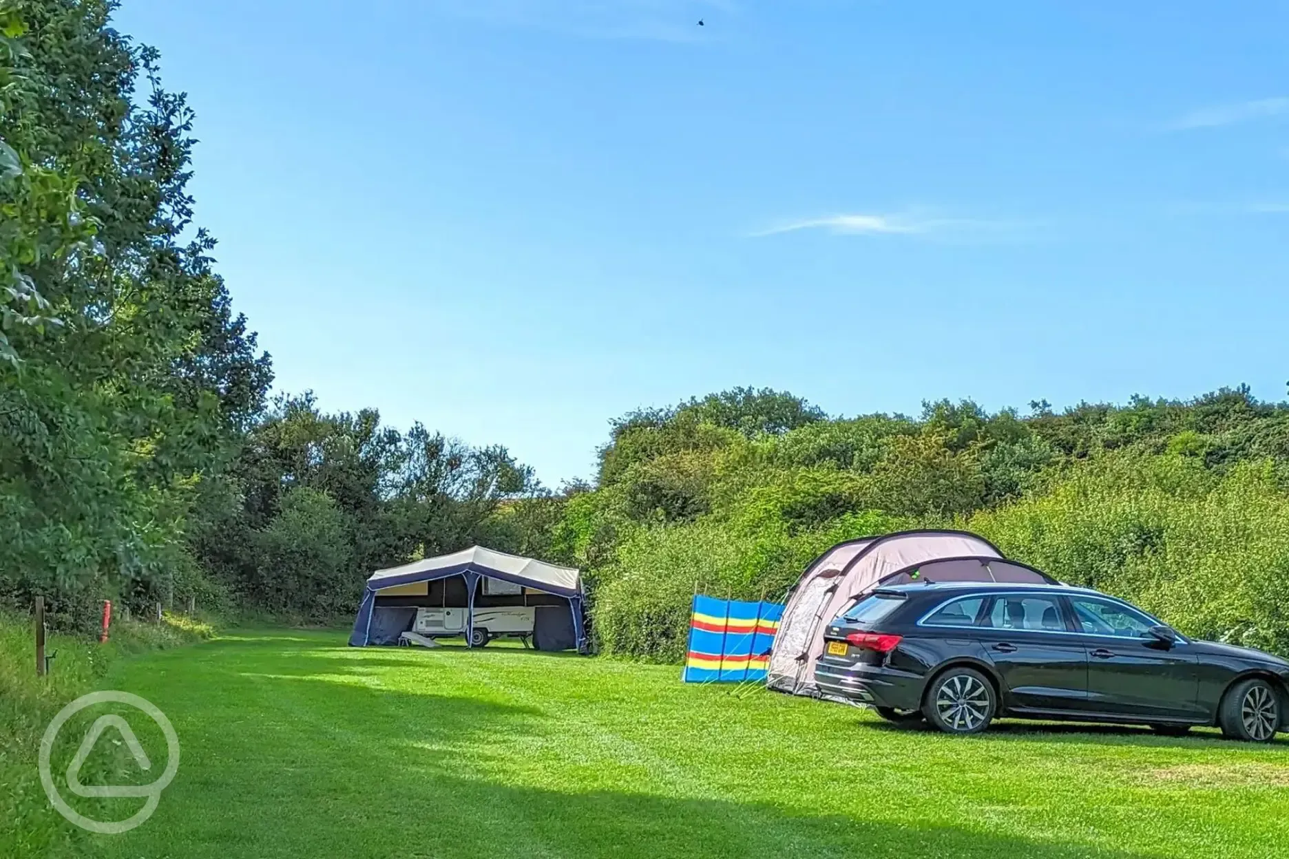Grass pitches with optional metered electric at York House Caravan Park Grass pitches with optional metered electric at York House Caravan Park