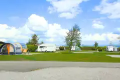 Electric hardstanding pitches (8m x 8m) with 10 amp hook ups Electric hardstanding pitches (8m x 8m) with 10 amp hook ups