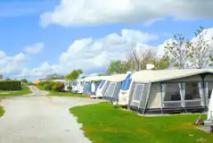 Electric hardstanding pitches (8m x 8m) with 10 amp hook ups Electric hardstanding pitches (8m x 8m) with 10 amp hook ups