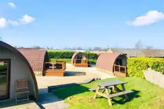 Mega glamping pods with glass front decking areas