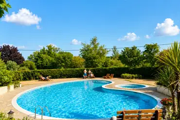 Outside heated swimming pool at Adgestone Campsite and Touring Park