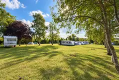 Electric grass pitches (Sunset Strip) at Adgestone Campsite and Touring Park