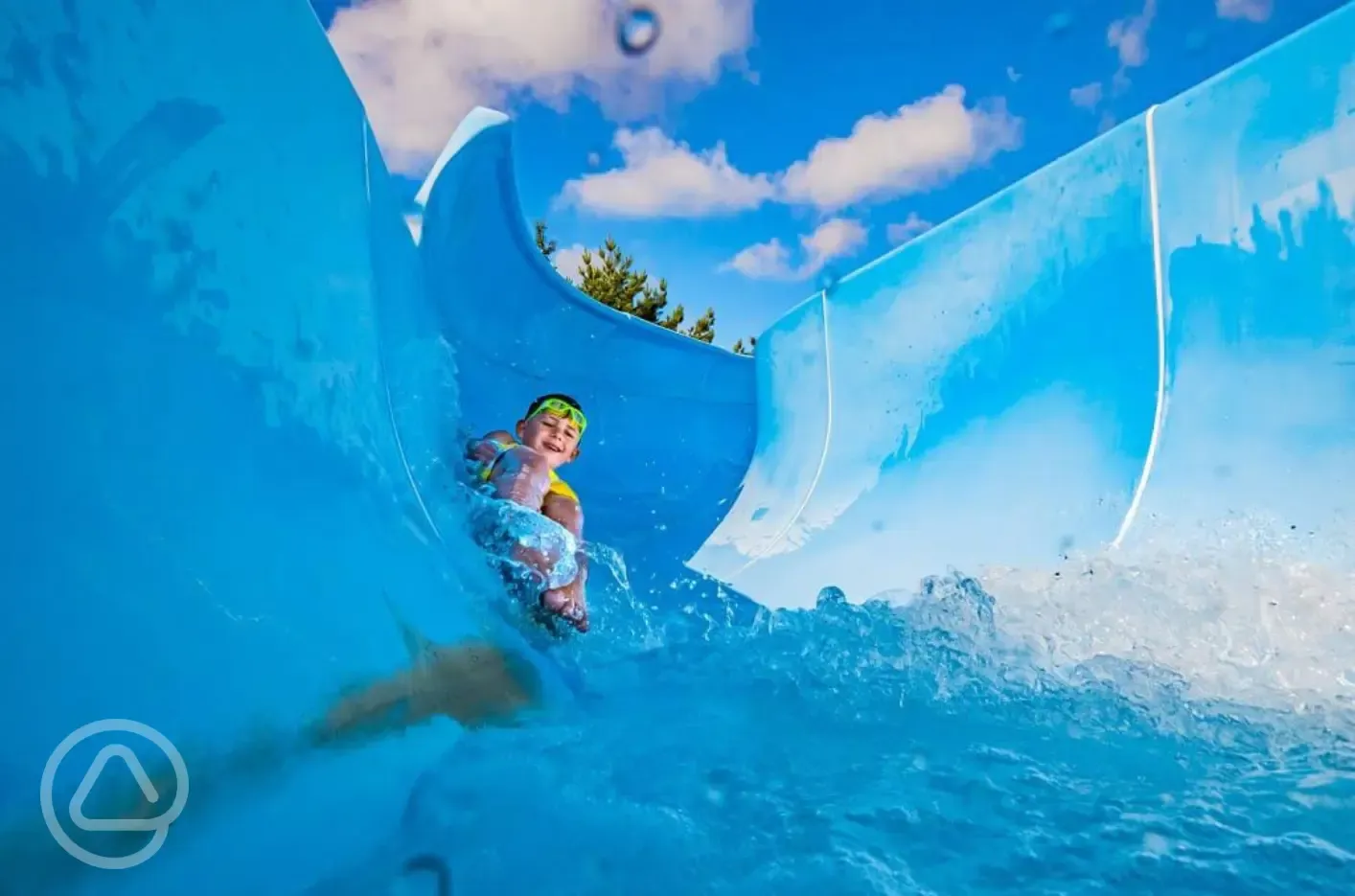 Outdoor swimming pool with a big slide (open during summer)