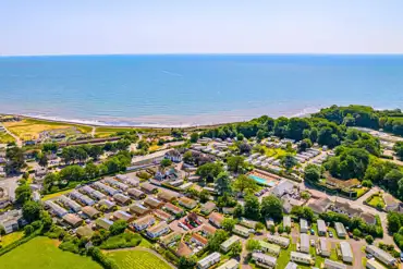Aerial of Lady's Mile Holiday Park towards the coast and Dawlish
