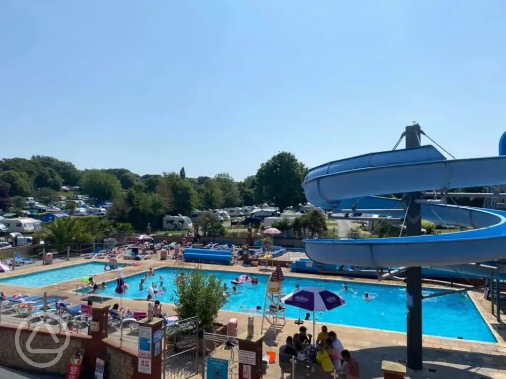 Outdoor swimming pool with a big slide (open during summer)