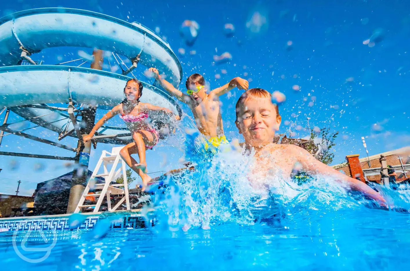 Outdoor swimming pool and slide (open during summer)