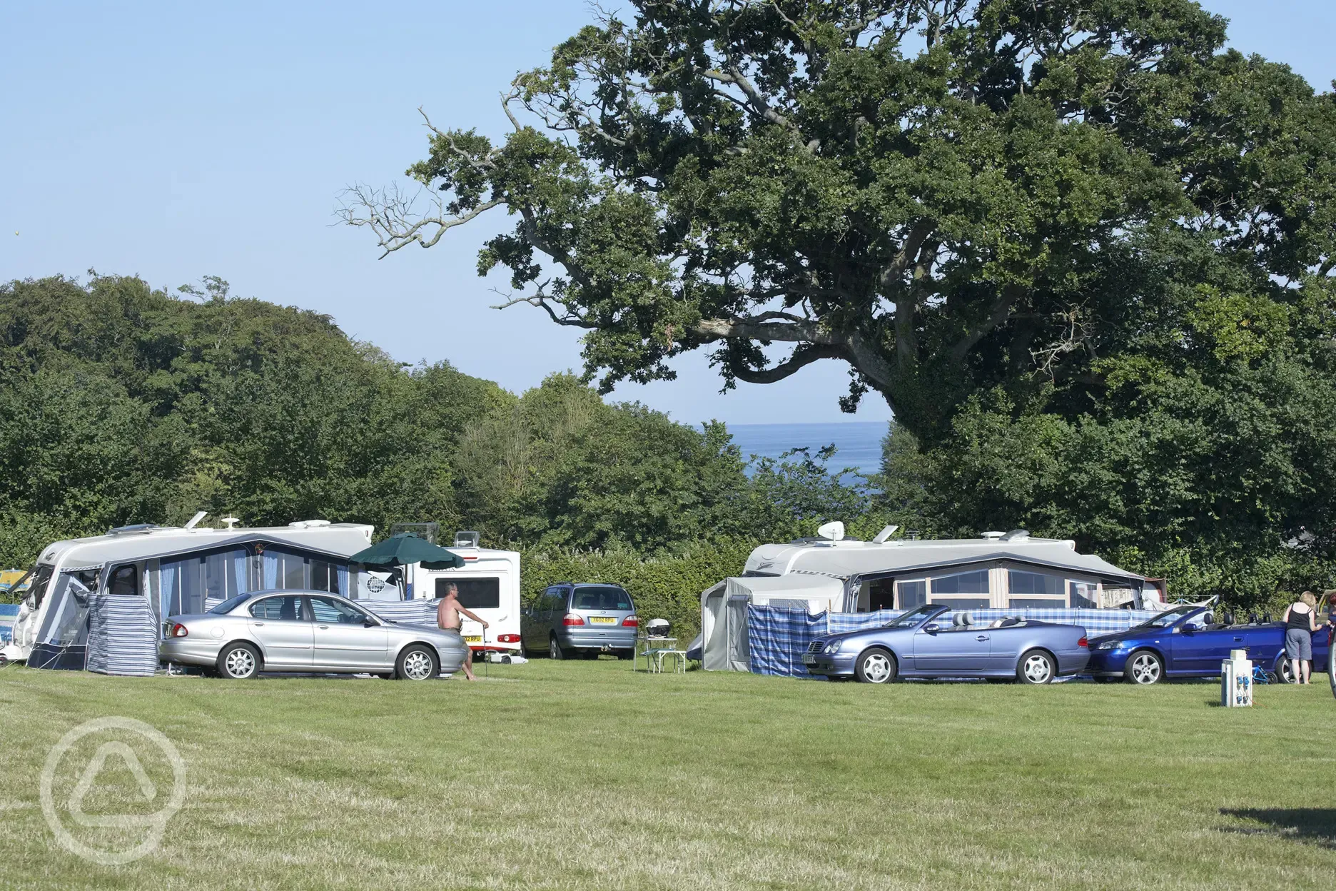 Touring caravan pitches with sea views at Leadstone Camping
