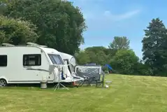 Electric grass touring pitches in the Owl Field Electric grass touring pitches in the Owl Field