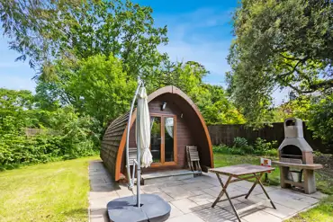 Mega pod with outdoor patio and BBQ at Langstone Manor Holiday Park