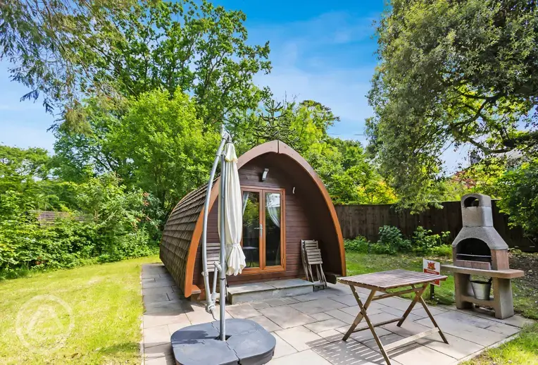 Mega pod with outdoor patio and BBQ at Langstone Manor Holiday Park
