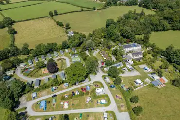 Aerial of Langstone Manor Holiday Park overlooking the pitches and pods