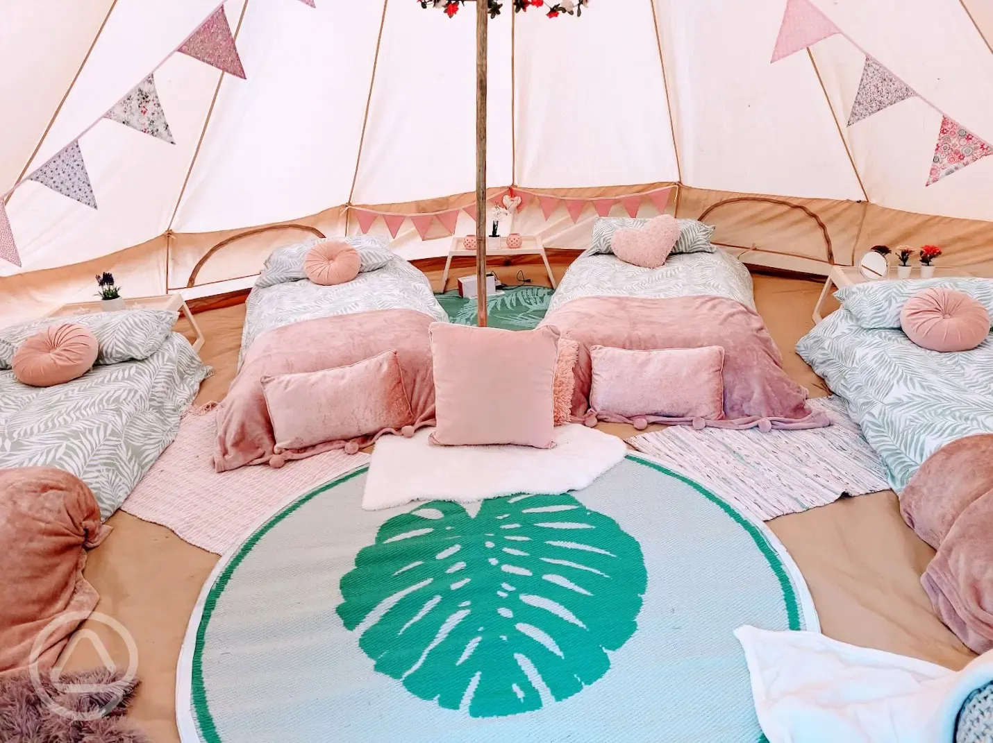 Bell tent interior with single beds