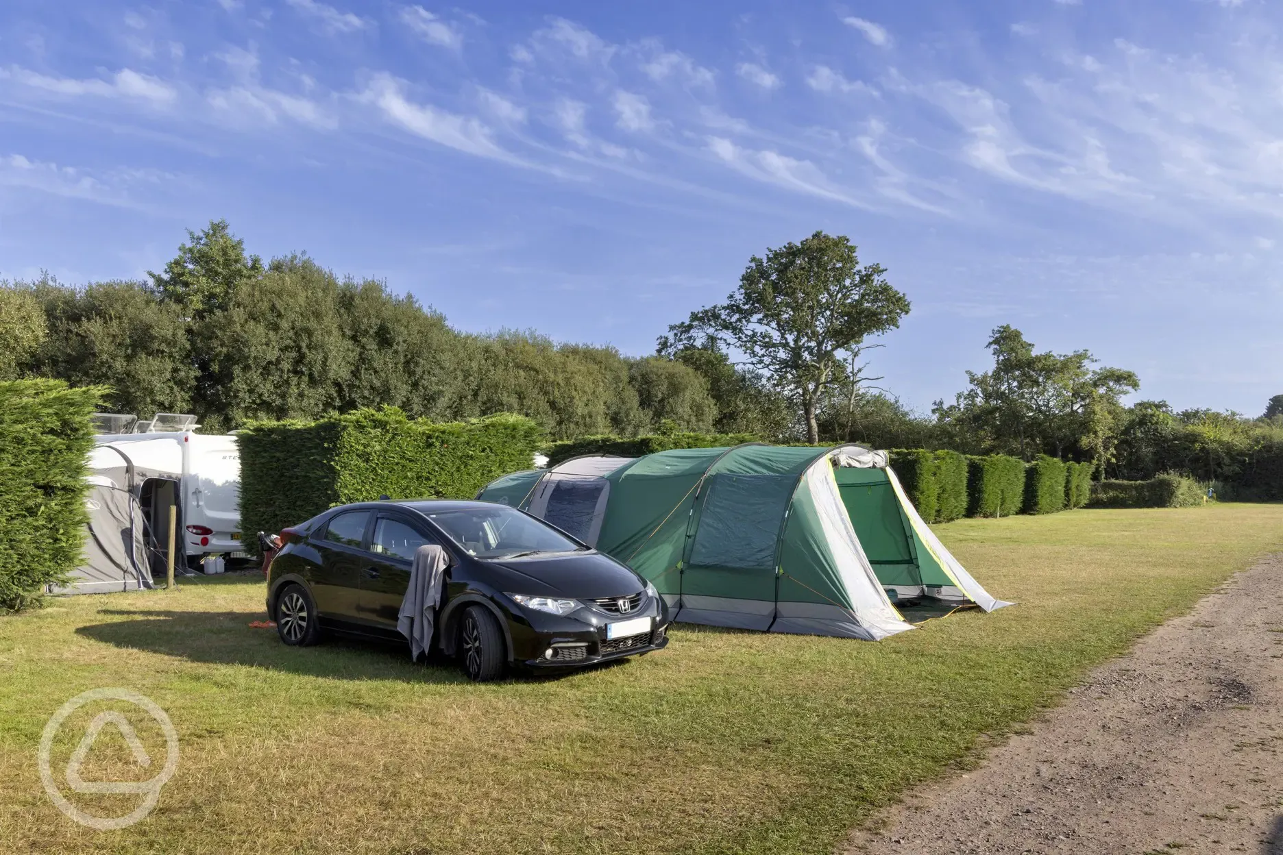 Non electric grass pitches with parking alongside