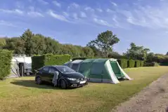 Non electric grass pitches with parking alongside