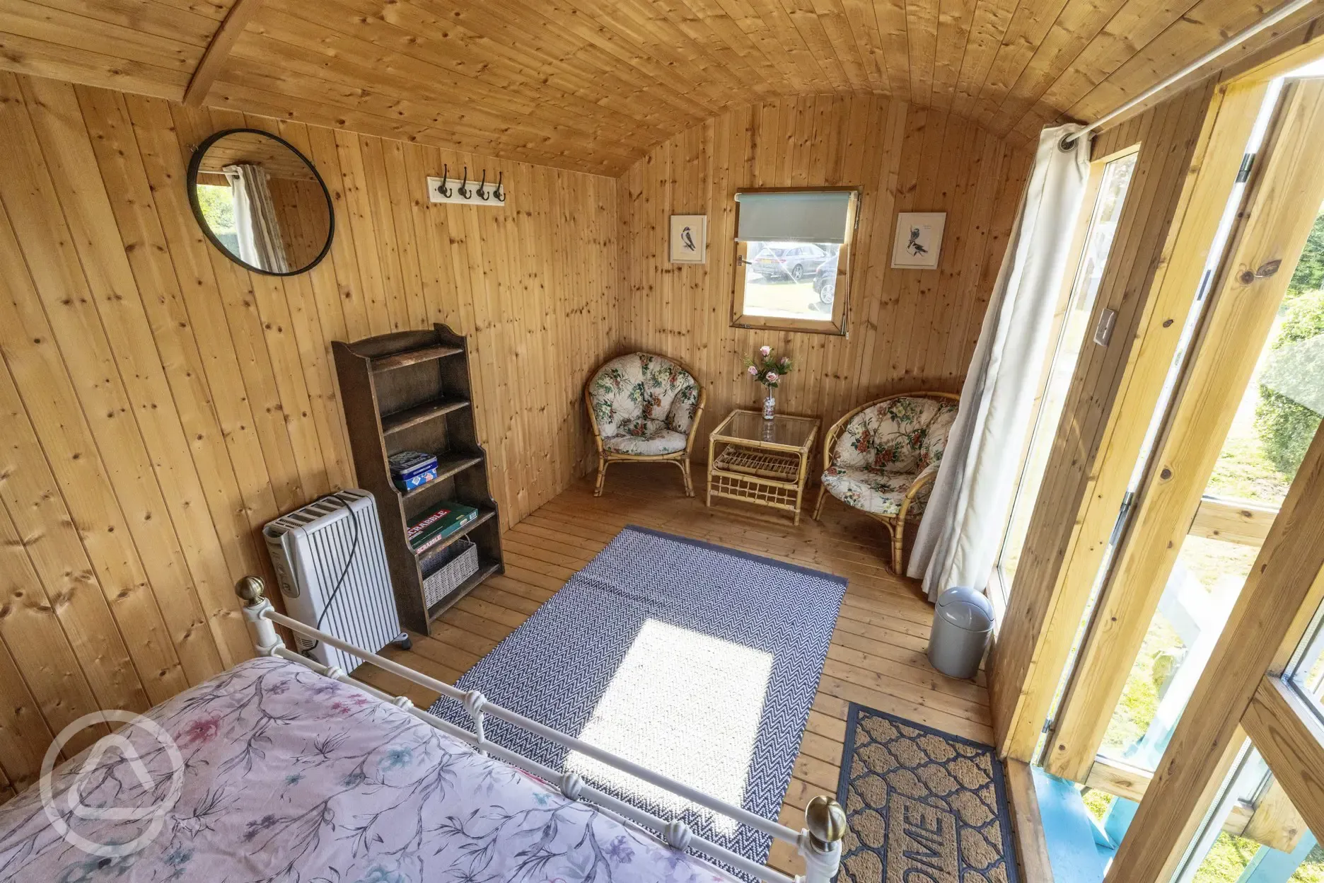Blue shepherd's hut interior and living space